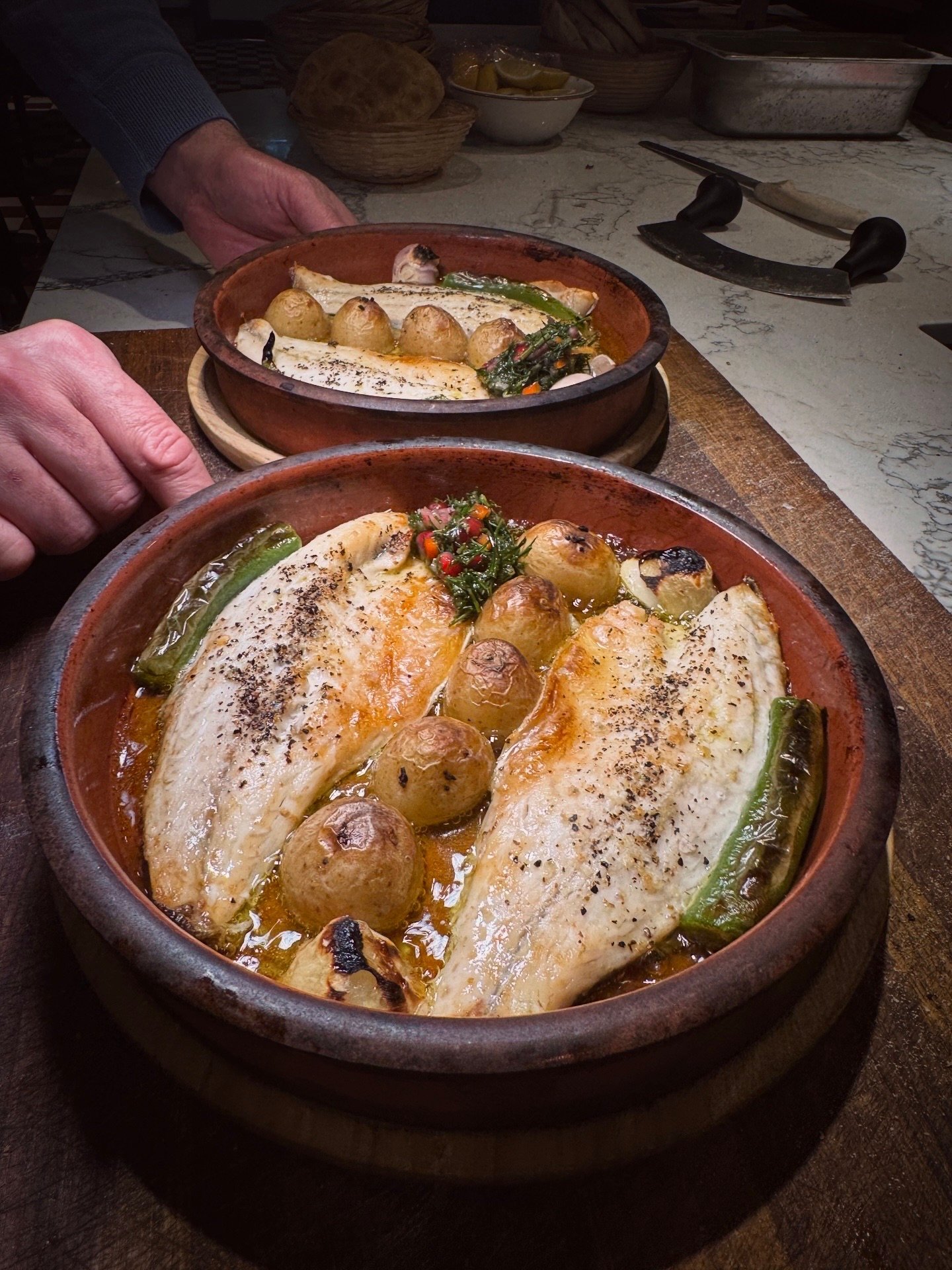 Fish prepared in clay pots