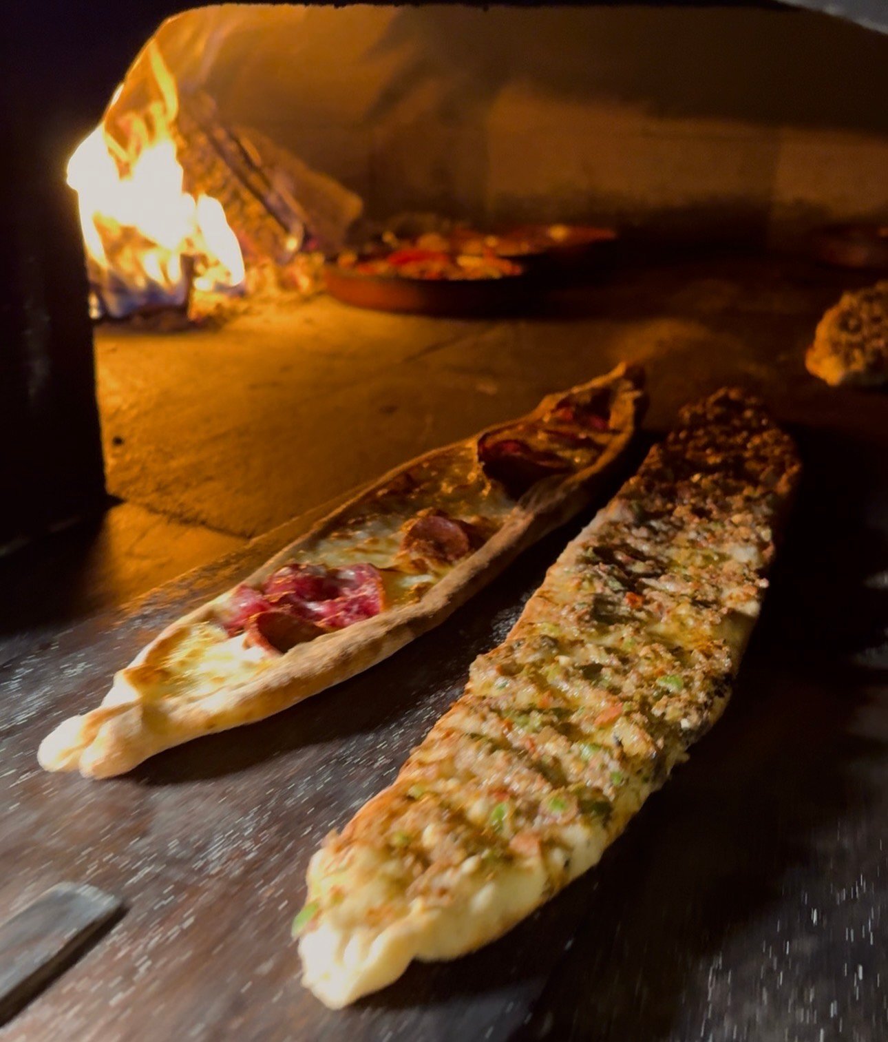Pide baking in the wood-fired oven